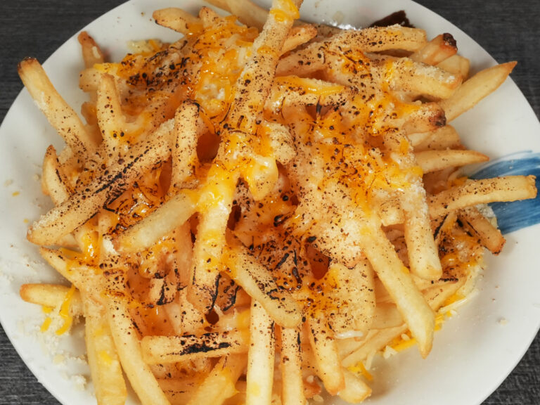 French fries topped with grilled cheese at Torrance Yokocho