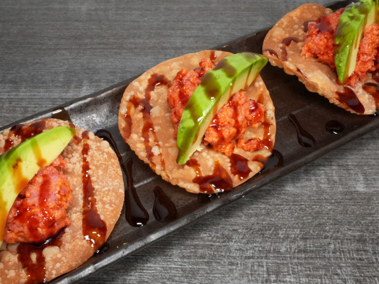 Japanese-style tostadas with spicy tuna and avocado and sauce at Torrance Yokocho