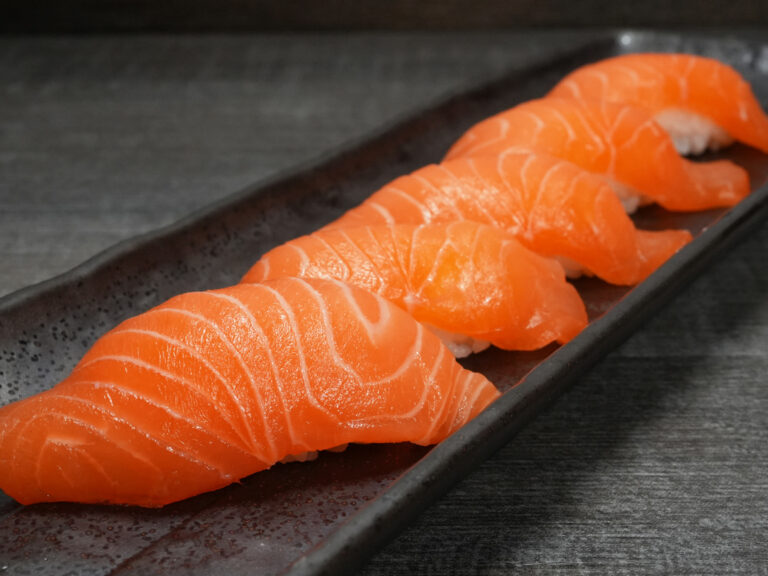 Salmon nigiri sushi, fresh sake at Torrance Yokocho