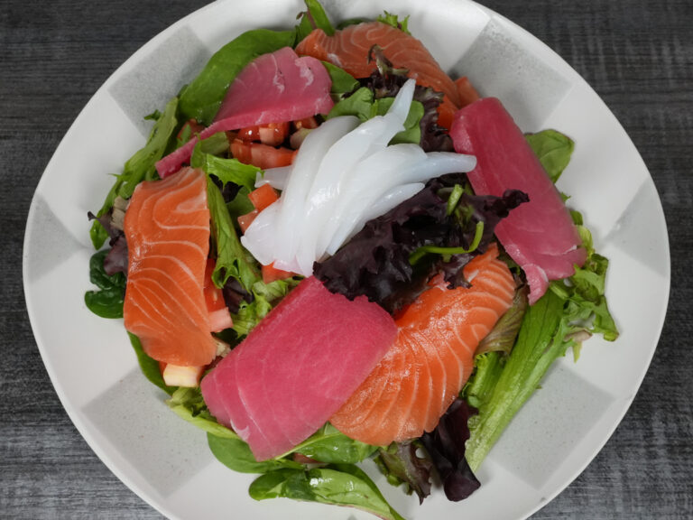 Sashimi salad with mixed greens and fresh fish slices at Torrance Yokocho