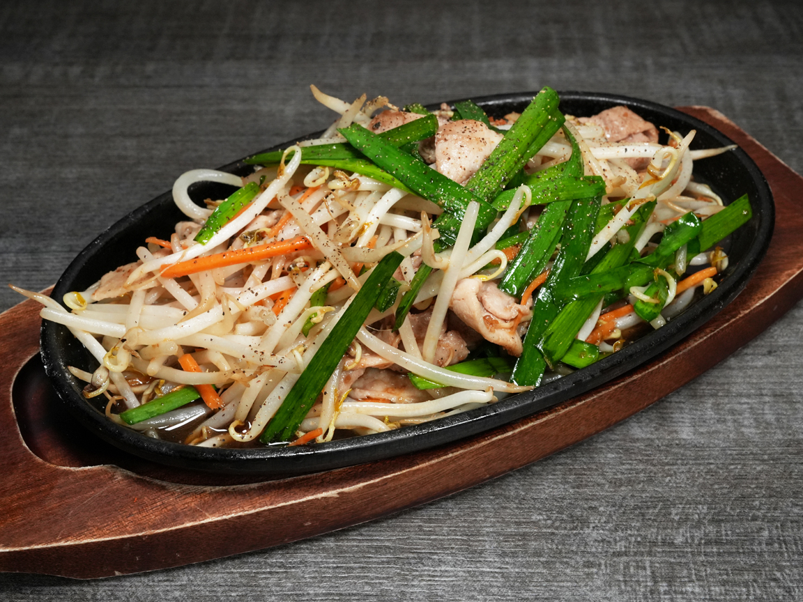 Pork and vegetable teppan stir-fry on hot plate at Torrance Yokocho